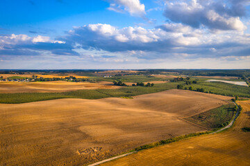 Fototapeta na wymiar Beautiful scenery of fields during harvest in northern Poland