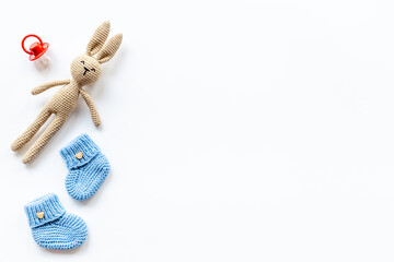 Baby accessories with rabbit toy and newborn booties shoes