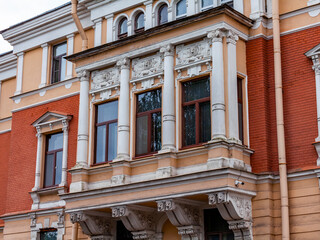 Vyborg, Russia, July 25, 2021. Fragment of a typical facade of a building of a historical...
