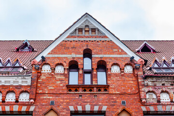 Vyborg, Russia, July 25, 2021. Fragment of a typical facade of a building of a historical...