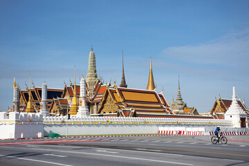 Landscape cityscape of BKK with traffic Ratchadamnoen Avenue and Wat Phra Si Rattana Satsadaram or Phra kaew temple while lockdown from Coronavirus COVID19 outbreak at Sanam Luang in Bangkok, Thailand