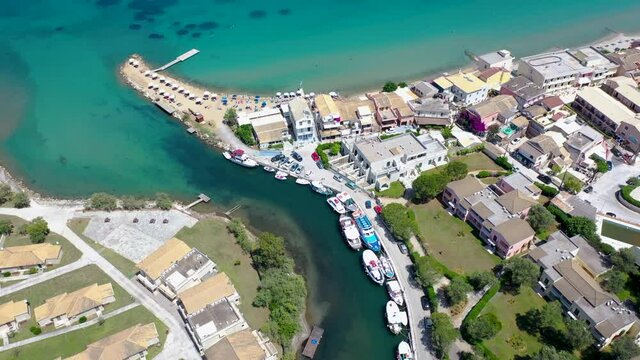 4k drone aerial video of water channel mouth on the Ionian Sea between Moraitika and Messonghi villages, Corfu Island in Greece