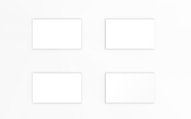 A template for inserting text or a picture. four white sheets of paper on a white background with shadows. Mock- up