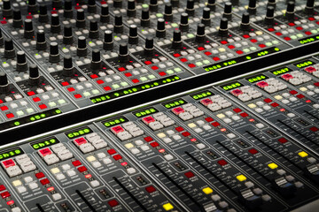 Audio sound mixer in a recording studio.
