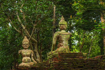 Ancient buddha figures Wat Umong Suan Puthatham is a Buddhist temple in the historic centre and is a Buddhist temple is a major tourist attraction with green forest nature in Chiang Mai,Thailand.