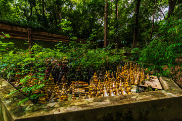 Ancient buddha figures Wat Umong Suan Puthatham is a Buddhist temple in the historic centre and is...