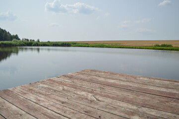 Naklejka premium Landscape with a bridge in a pond, Synkovichi