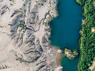 Blue lakes in the Romantsevsky mountains from a bird's eye view at sunrise, Konduki village, Tula region, Russia