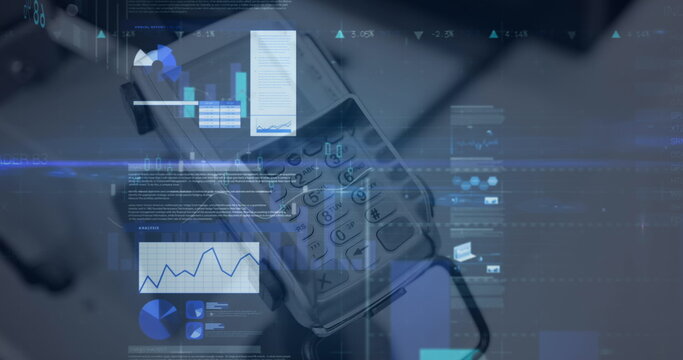 Image of financial data processing over credit card terminal - Powered by Adobe