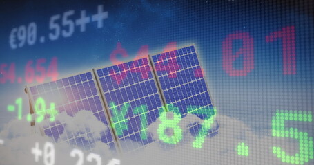 Stock market data processing against solar panels in blue sky