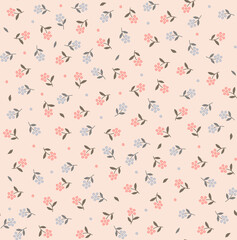 Beautiful floral pattern in small abstract flowers. Small blue and red flowers. Pastel pink background. Ditsy print. Floral seamless background. The elegant the template for fashion prints. Stock 