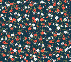 Cute floral pattern. Seamless vector pattern. Elegant template for fashion prints. Small white  and red flowers. Navy blue background. Summer and spring motifs. Stock vector.