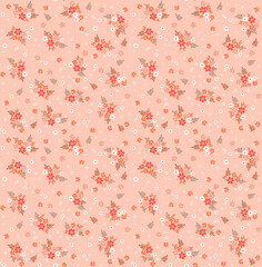 Beautiful floral pattern in small abstract flowers. Small reddish flowers. Pastel coral background. Ditsy print. Floral seamless background. The elegant the template for fashion prints. Stock pattern.