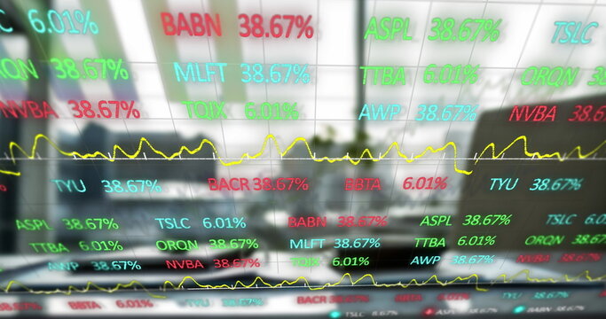 Digital composite image of stock market data processing against office equipment on desk
