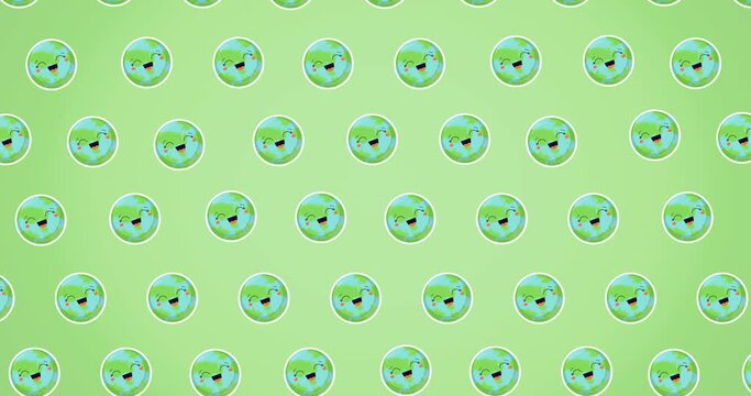 Animation of multiple laughing globes on green background