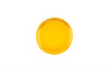 Organic and fresh honey in glass bowl isolated on white background. Healthy food concept.