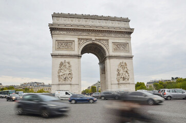 Fototapeta na wymiar The Arc de Triomphe de l'etoile is one of the most famous monuments in Paris.