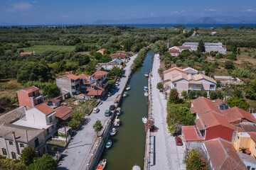 Drone view of water canal in Lefkimmi, small town on Corfu - Kerkyra Island, Greece