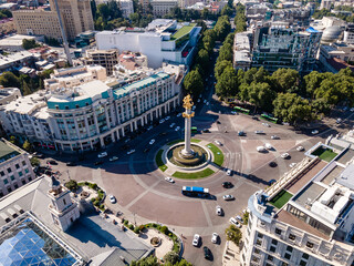 Tbilisi, Georgia. Liberty Monument Depicting St George Slaying The Dragon And Tbilisi City Hall In Freedom Square In City Center. Famous Landmark