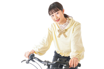Obraz na płótnie Canvas 自転車を運転する若い女性