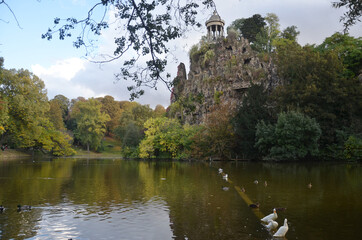 Autumn at The Parc des Buttes Chaumont is a public park situated in northeastern Paris, France, in...
