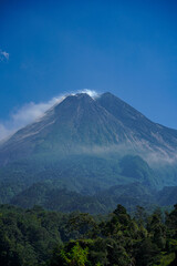 Fototapeta premium awesome view of Mount Merapi in the morning and emitting smoke, a mountain that is still active until now