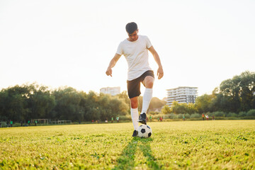 One person only. Young soccer player have training on the sportive field