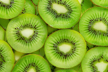 Kiwi Macro,slice of kiwi fruit on a full frame. horizont