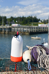 Lobster buoys on a dock waiting to be loaded