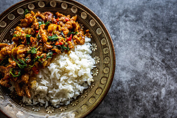 Top view of basil rice with pork or beef, Thai food