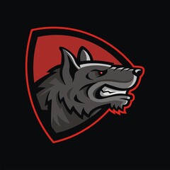 Wolf head mascot in shield.