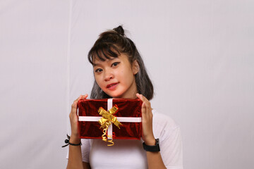 Beautiful woman giving gifts isolated white background