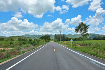 Fototapeta na wymiar Country road to the Mountain natural landscape,Tropical of rural in Thailand.