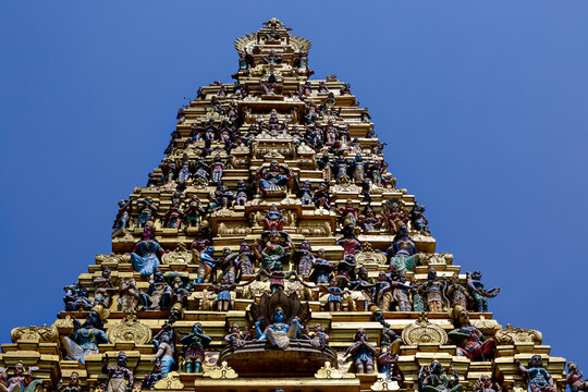 Decoration over the tower of the Hindu Temple Sri Muthumariamman Kovil in Matale, Sri Lanka