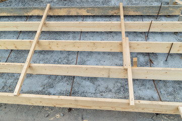 Formwork made of boards for pouring concrete street stairs