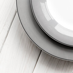 The modern classical porcelain set of plates stands on a white table