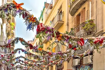 Foto auf Alu-Dibond Barcelona, Spain: 08.18.2021  The handmade flowers decoration from recycling materials  in Barcelona © Oksana