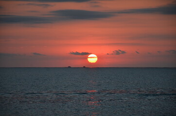 Sunset and surf on the beach in Loo, Russia, Krasnodar Territory