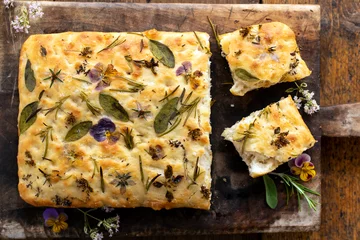 Aluminium Prints Bread Freshly baked focaccia with herbs and flowers