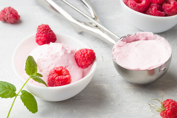 Delicious and romantic dessert. A ball of homemade raspberry walrus with fresh raspberries and mint...