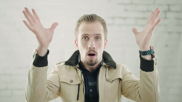 Portrait  of male person show mind blown fact 4K