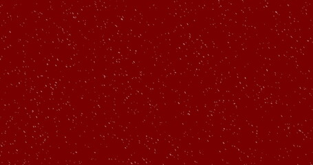 Image of winter scenery with snow falling on red background