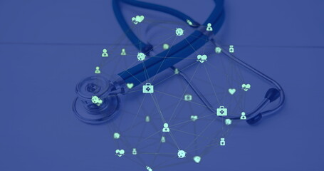Globe of digital icons against stethoscope