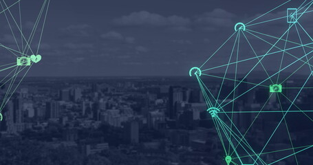 Globe of digital icons against cityscape