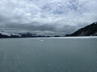 clouds of silhouetted mountain range