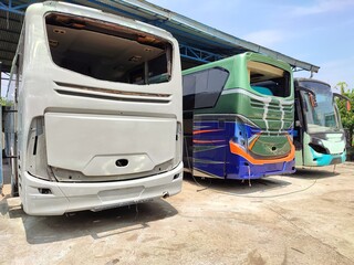 Bogor, Indonesia - August 20, 2021: old bus under repair