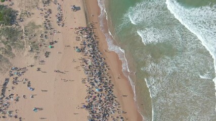 Open of Surfing hosts an event for the Professional surfing association, the World Surf championship in Beach, Professional Competition.Championship Tour Aerial view of World Surf League Tour city.