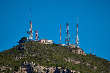 Obraz premium Communication antennas on the mountain