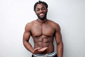 Athlete afro american man with beautiful torso, isolated on white background. Naked torso of black...