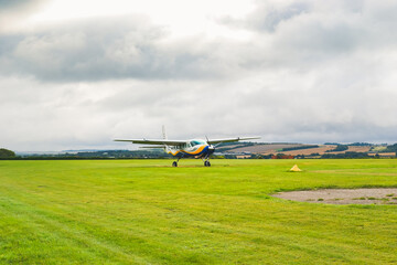 UK, Salisbury, 15.08.2021: a small plane from 'GoSkydive' awaits people to land for parachute...
